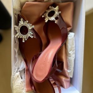 Amina Muaddi Slingback Begum Glass pump.